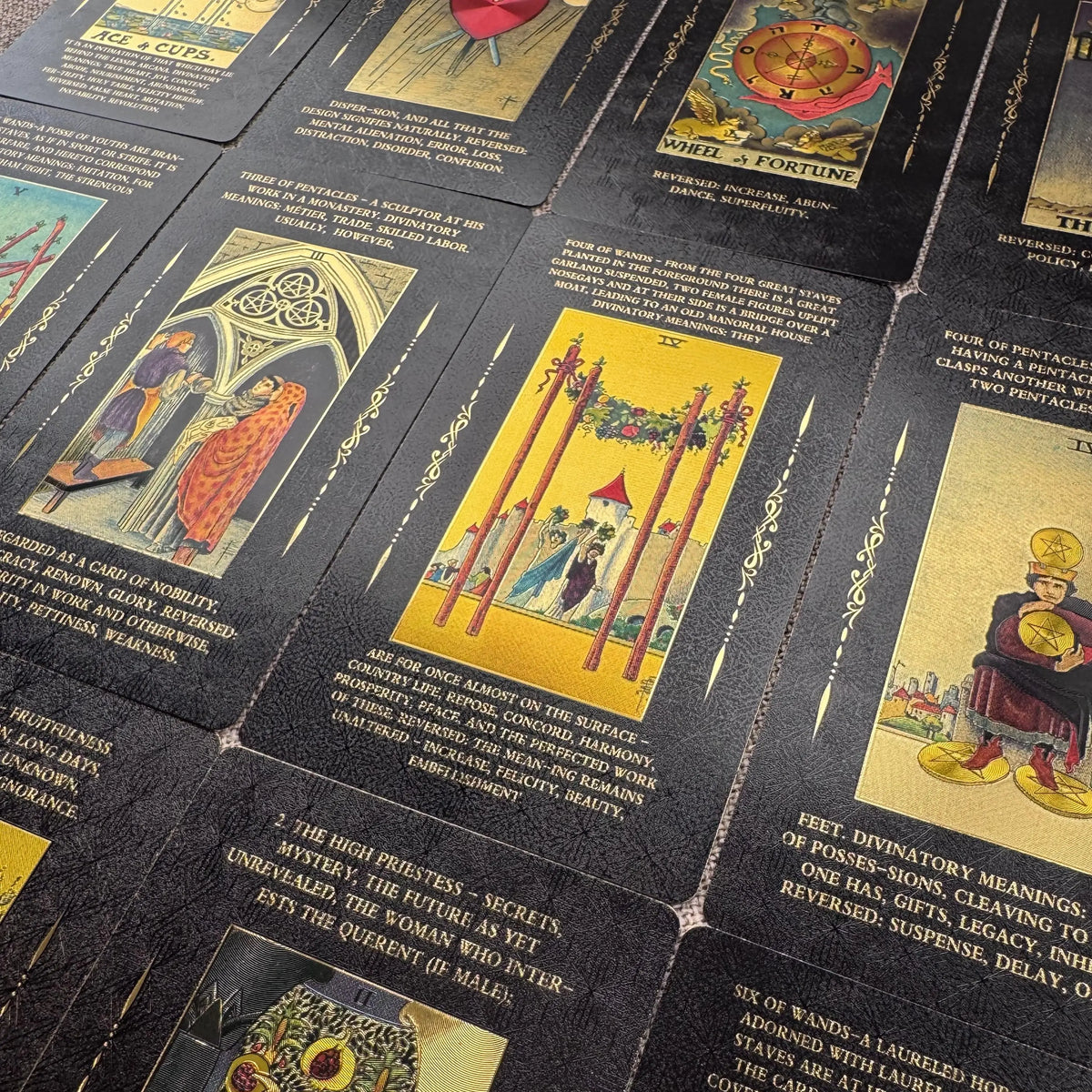 Collection of tarot cards with colorful illustrations and text on a black background